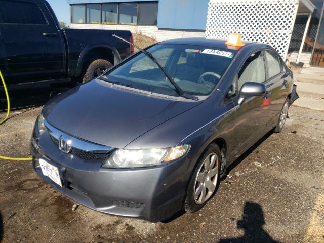 Photo 1 VIN: 2HGFA1F53AH308553 - HONDA CIVIC LX 