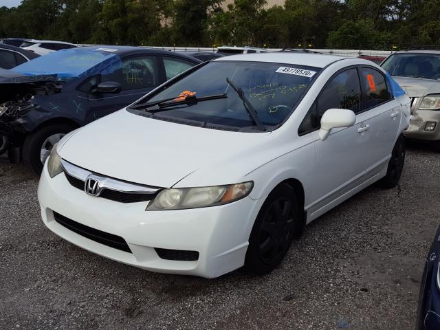 Photo 1 VIN: 2HGFA1F53AH521793 - HONDA CIVIC LX 