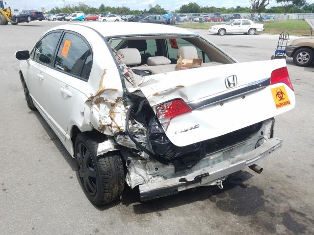 Photo 2 VIN: 2HGFA1F53AH521793 - HONDA CIVIC LX 