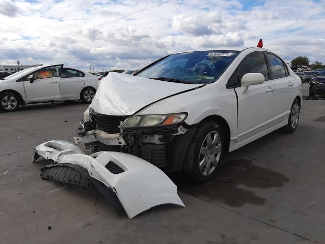 Photo 1 VIN: 2HGFA1F53AH523074 - HONDA CIVIC LX 