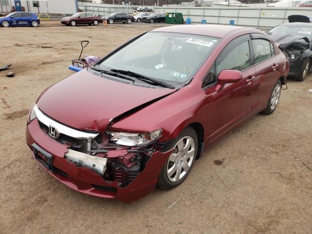 Photo 1 VIN: 2HGFA1F53AH530848 - HONDA CIVIC LX 