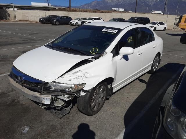 Photo 1 VIN: 2HGFA1F53AH540473 - HONDA CIVIC LX 