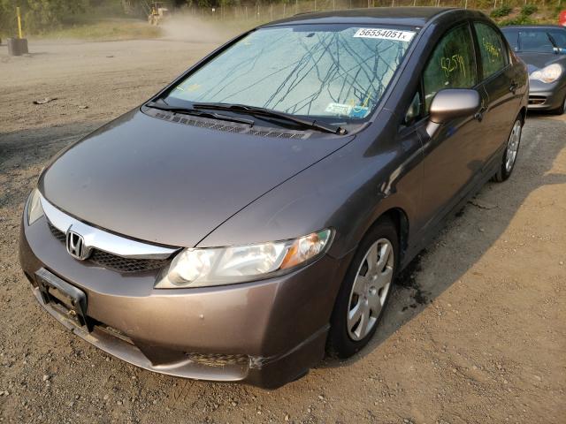 Photo 1 VIN: 2HGFA1F53AH580262 - HONDA CIVIC LX 