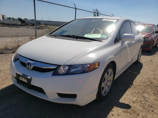 Photo 1 VIN: 2HGFA1F53AH583601 - HONDA CIVIC LX 