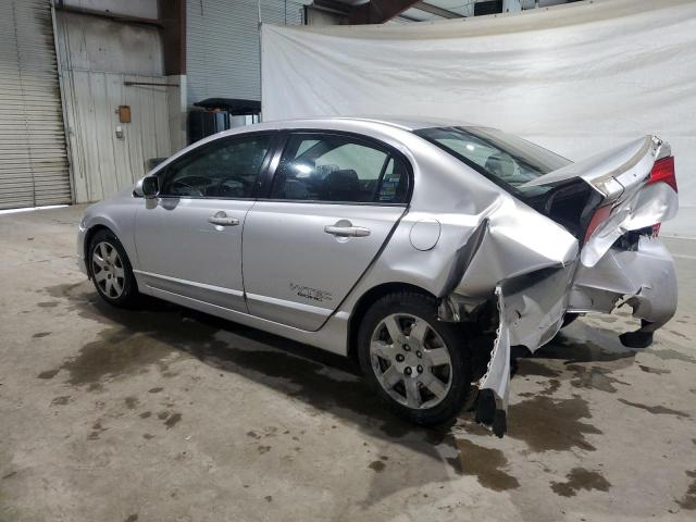 Photo 1 VIN: 2HGFA1F54AH304172 - HONDA CIVIC LX 