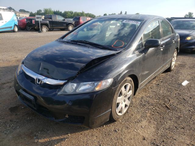 Photo 1 VIN: 2HGFA1F54AH306830 - HONDA CIVIC LX 