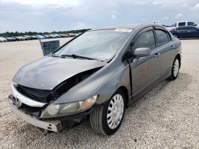 Photo 1 VIN: 2HGFA1F54AH310747 - HONDA CIVIC LX 