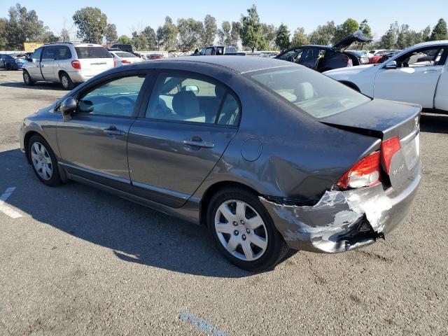 Photo 1 VIN: 2HGFA1F54AH317553 - HONDA CIVIC LX 