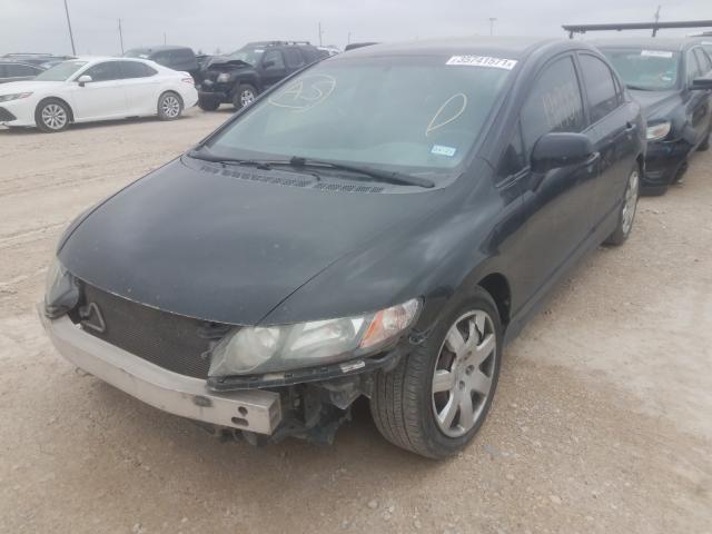 Photo 1 VIN: 2HGFA1F54AH330898 - HONDA CIVIC LX 