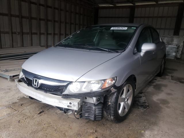 Photo 1 VIN: 2HGFA1F54AH513671 - HONDA CIVIC LX 