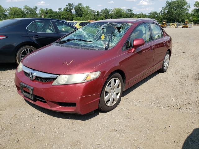 Photo 1 VIN: 2HGFA1F54AH550882 - HONDA CIVIC LX 