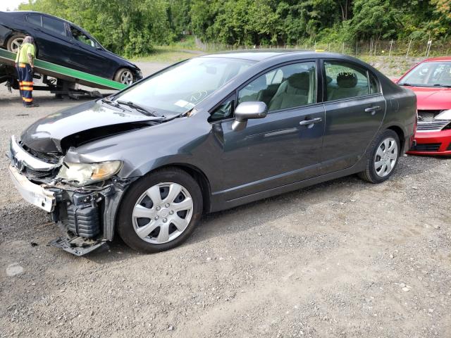 Photo 1 VIN: 2HGFA1F54AH553779 - HONDA CIVIC LX 