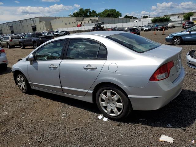 Photo 1 VIN: 2HGFA1F54AH587091 - HONDA CIVIC LX 