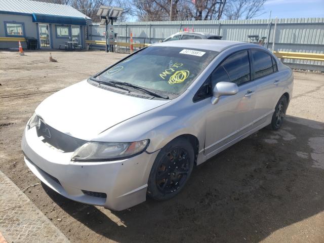 Photo 1 VIN: 2HGFA1F54AH587415 - HONDA CIVIC LX 