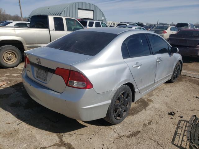 Photo 3 VIN: 2HGFA1F54AH587415 - HONDA CIVIC LX 