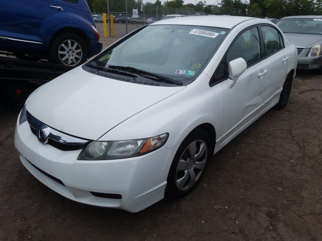 Photo 1 VIN: 2HGFA1F54BH307686 - HONDA CIVIC LX 