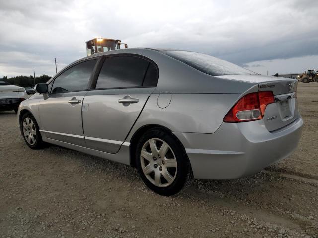 Photo 1 VIN: 2HGFA1F55AH303094 - HONDA CIVIC LX 