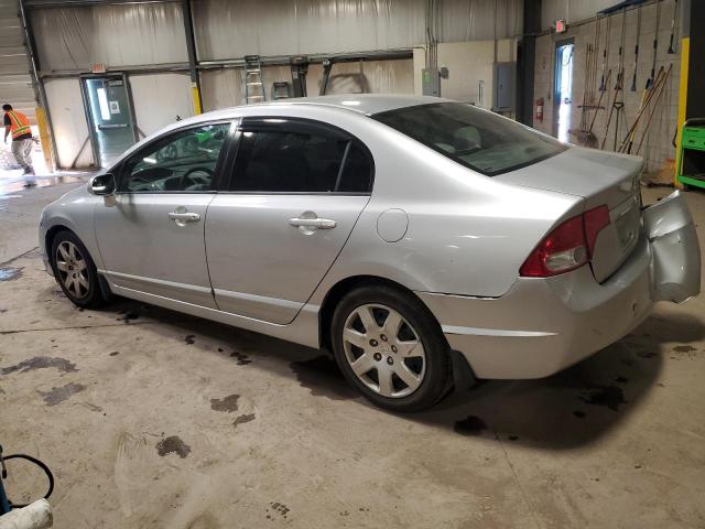 Photo 1 VIN: 2HGFA1F55AH312264 - HONDA CIVIC LX 