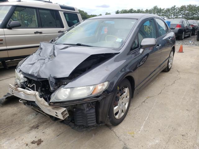 Photo 1 VIN: 2HGFA1F55AH321787 - HONDA CIVIC LX 