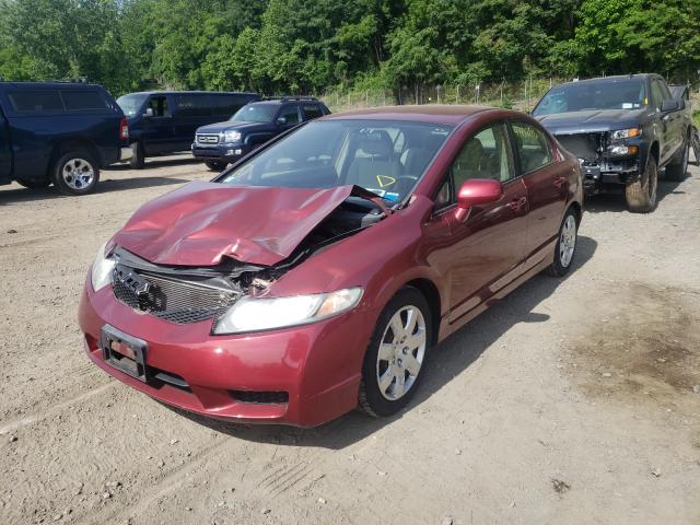 Photo 1 VIN: 2HGFA1F55AH504459 - HONDA CIVIC LX 