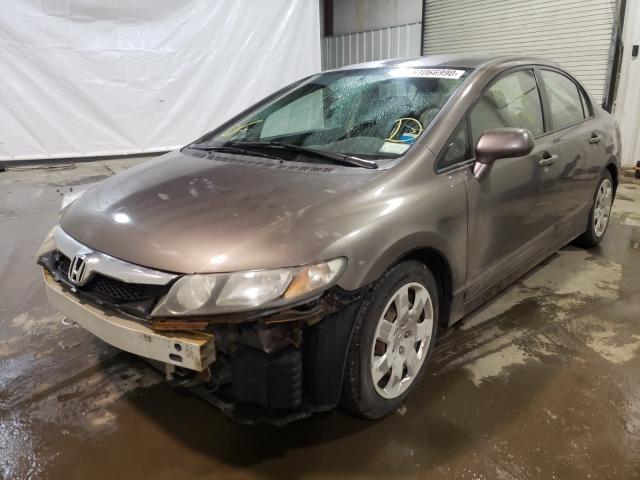 Photo 1 VIN: 2HGFA1F55AH536599 - HONDA CIVIC LX 