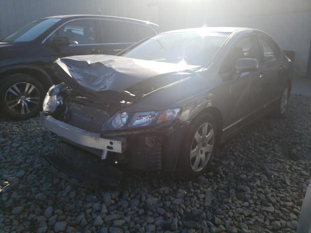 Photo 1 VIN: 2HGFA1F55AH546050 - HONDA CIVIC LX 