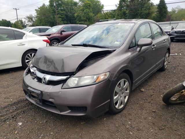 Photo 1 VIN: 2HGFA1F55AH552401 - HONDA CIVIC LX 