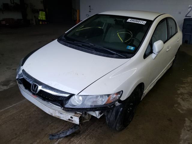 Photo 1 VIN: 2HGFA1F55AH565987 - HONDA CIVIC LX 