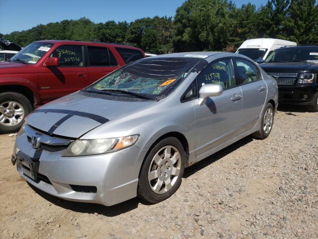 Photo 1 VIN: 2HGFA1F55AH582059 - HONDA CIVIC LX 