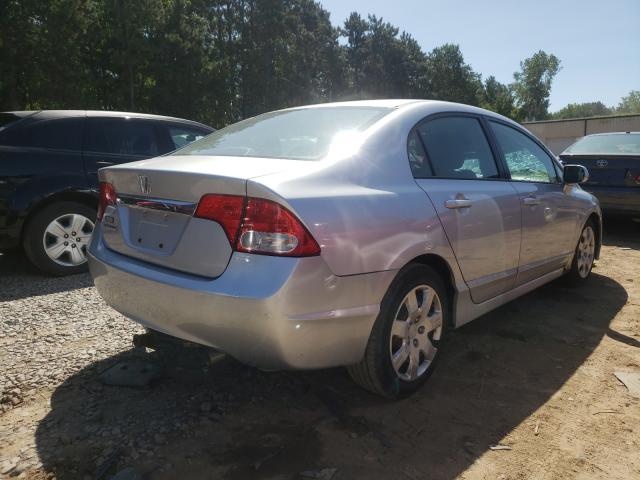 Photo 3 VIN: 2HGFA1F55AH582059 - HONDA CIVIC LX 