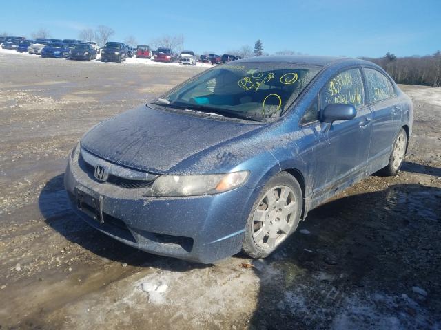 Photo 1 VIN: 2HGFA1F55AH583907 - HONDA CIVIC LX 