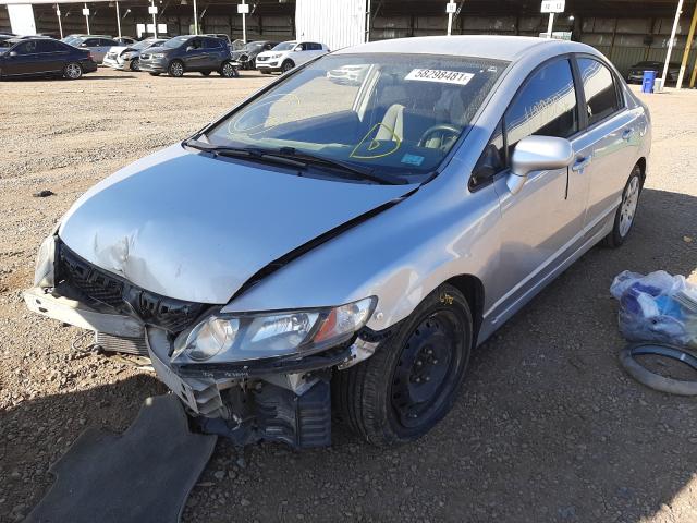 Photo 1 VIN: 2HGFA1F55BH305252 - HONDA CIVIC LX 