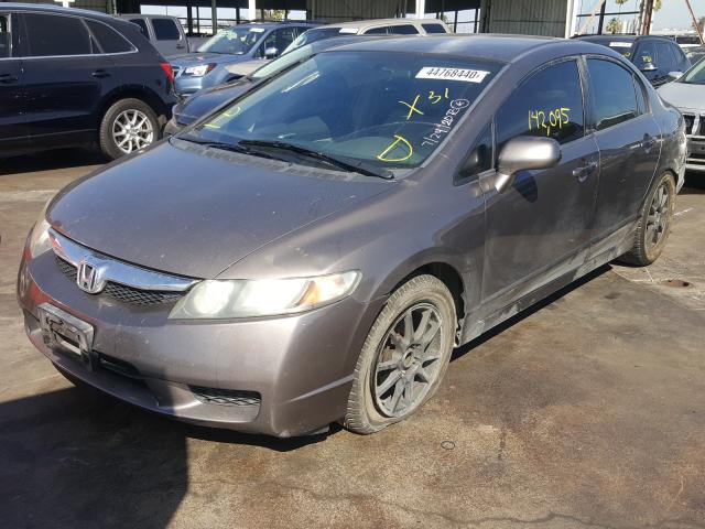 Photo 1 VIN: 2HGFA1F55BH505757 - HONDA CIVIC LX 