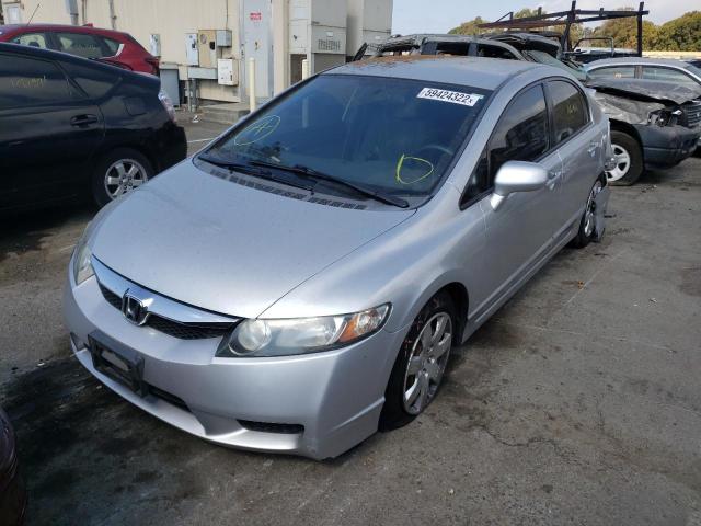 Photo 1 VIN: 2HGFA1F56AH306585 - HONDA CIVIC LX 