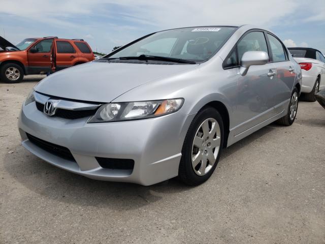 Photo 1 VIN: 2HGFA1F56AH310054 - HONDA CIVIC LX 