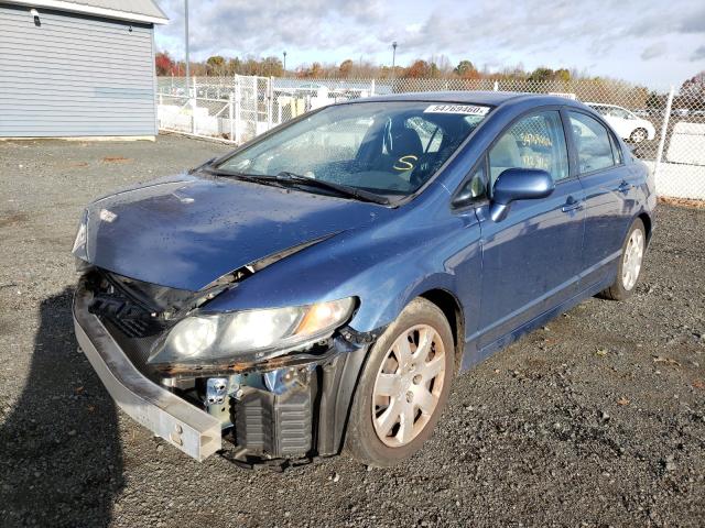 Photo 1 VIN: 2HGFA1F56AH318543 - HONDA CIVIC LX 