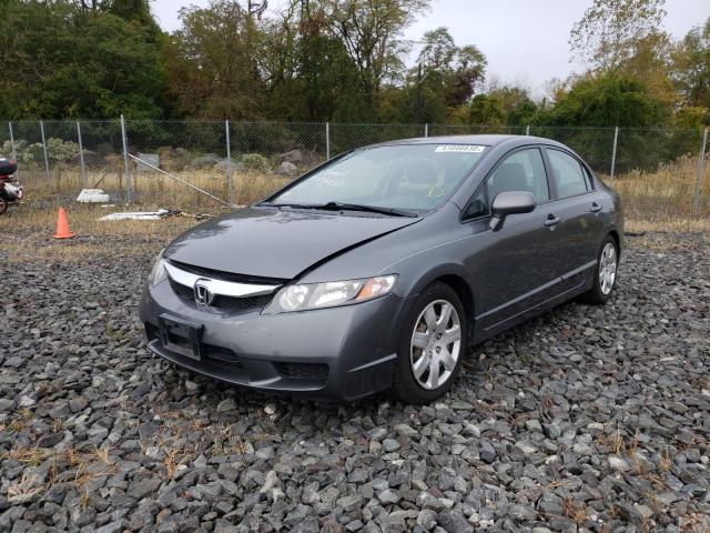 Photo 1 VIN: 2HGFA1F56AH322348 - HONDA CIVIC LX 