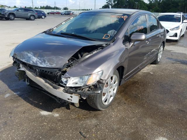 Photo 1 VIN: 2HGFA1F56AH511517 - HONDA CIVIC LX 