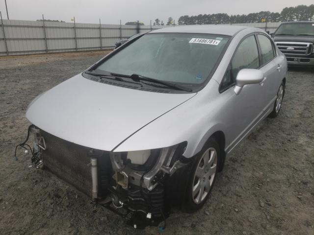 Photo 1 VIN: 2HGFA1F56AH539995 - HONDA CIVIC LX 