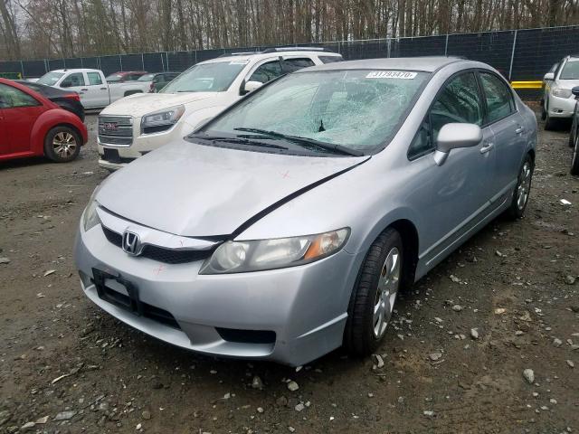 Photo 1 VIN: 2HGFA1F56BH303879 - HONDA CIVIC LX 