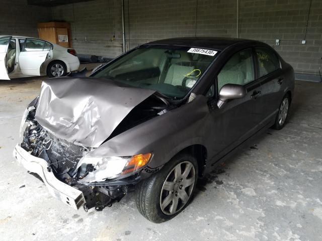 Photo 1 VIN: 2HGFA1F56BH522177 - HONDA CIVIC LX 