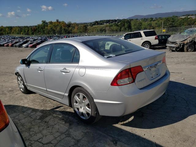 Photo 1 VIN: 2HGFA1F57AH307180 - HONDA CIVIC LX 