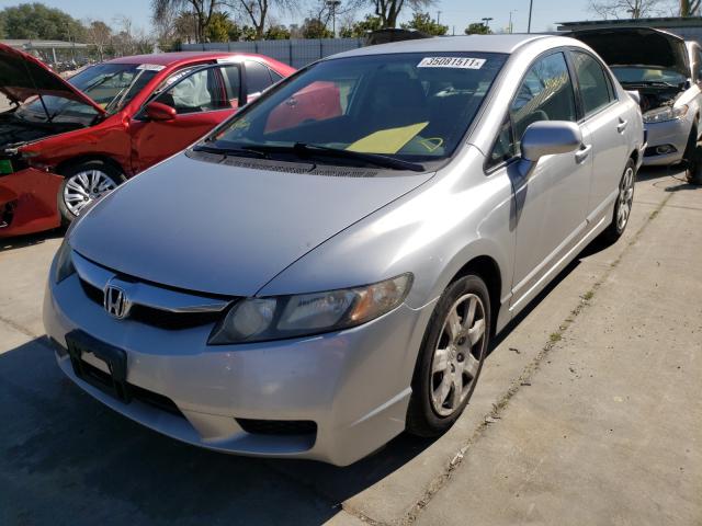 Photo 1 VIN: 2HGFA1F57AH318485 - HONDA CIVIC LX 