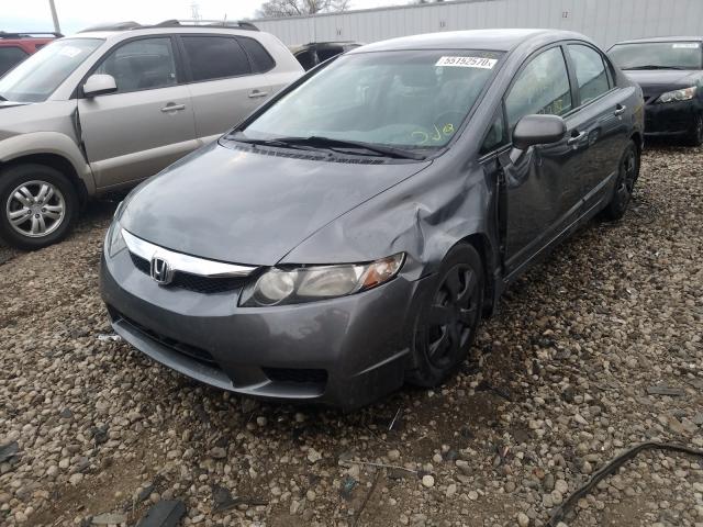 Photo 1 VIN: 2HGFA1F57AH326747 - HONDA CIVIC LX 