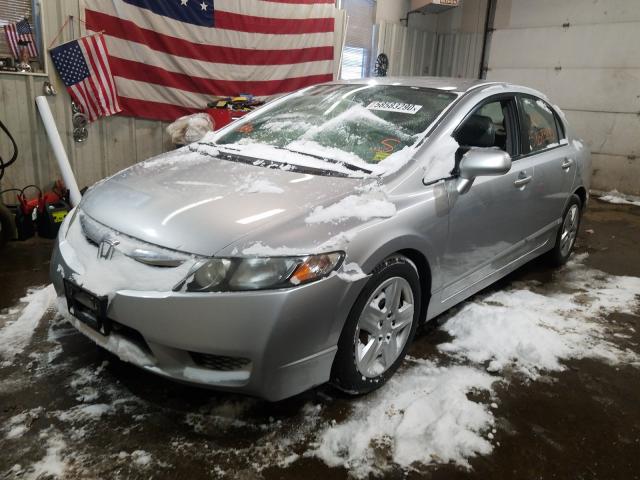 Photo 1 VIN: 2HGFA1F57AH328837 - HONDA CIVIC LX 