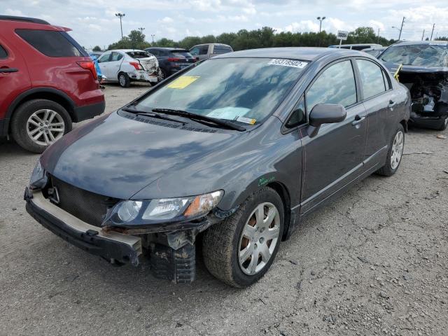 Photo 1 VIN: 2HGFA1F57AH329728 - HONDA CIVIC LX 