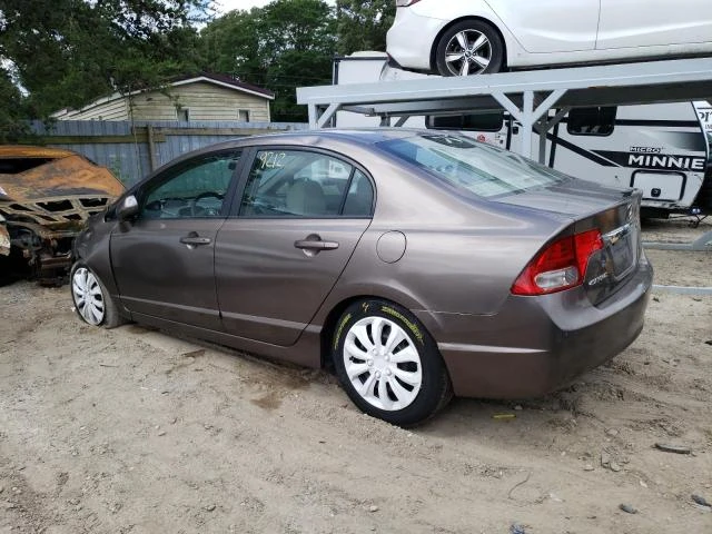 Photo 1 VIN: 2HGFA1F57AH521151 - HONDA CIVIC LX 