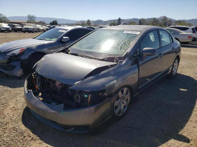 Photo 1 VIN: 2HGFA1F57AH535938 - HONDA CIVIC LX 