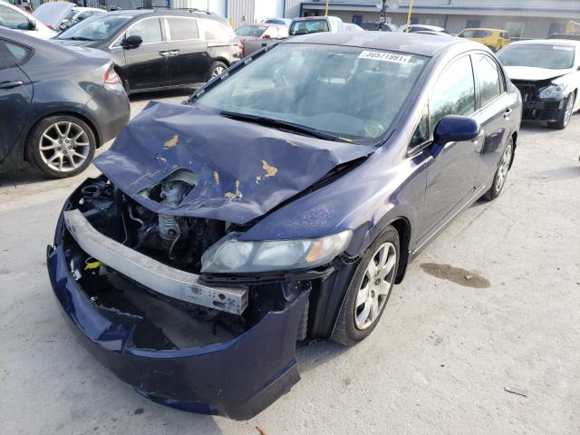 Photo 1 VIN: 2HGFA1F57AH539570 - HONDA CIVIC LX 