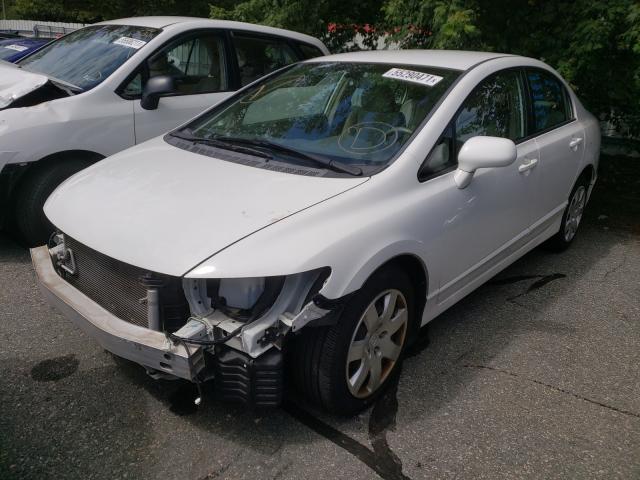 Photo 1 VIN: 2HGFA1F57AH566350 - HONDA CIVIC LX 